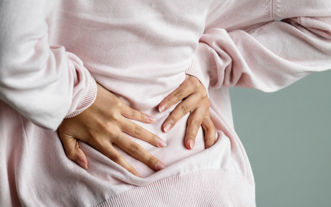 When should I go to the emergency room for back pain?