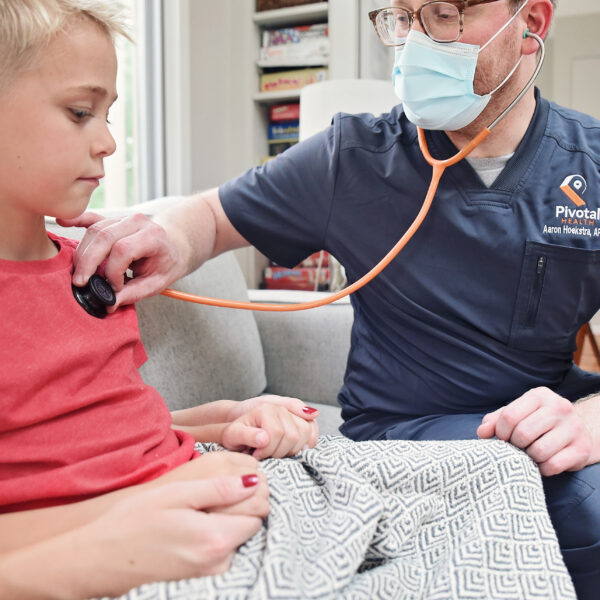 Nurse using stethoscope