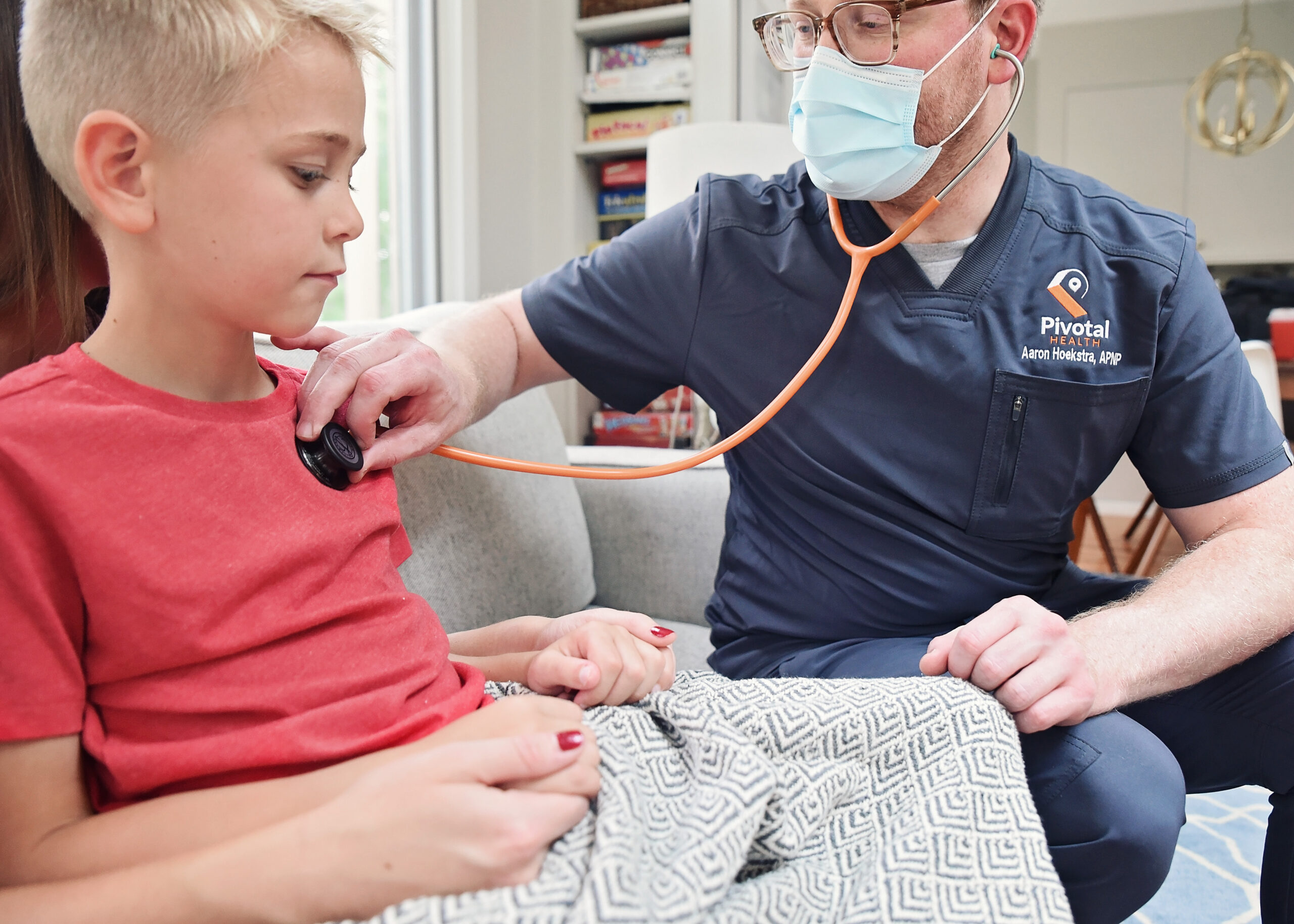 Nurse using stethoscope